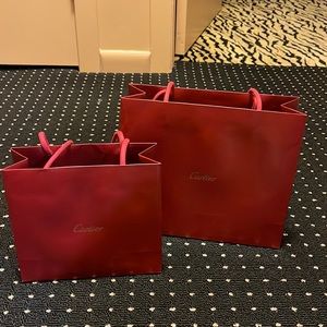 Small and medium cartier shopping bag. Very good condition